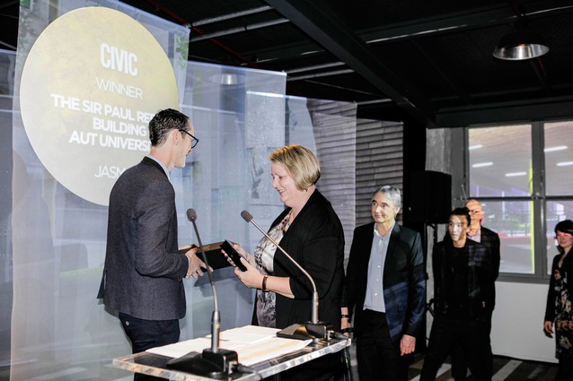 Civic Award winner, Jasmax, receving trophy.