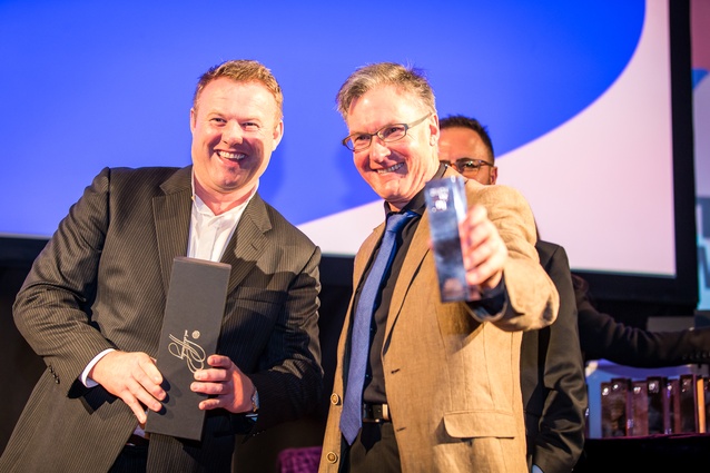 Craig McAuliffe and Preston Stevens (McAuliffe Stevens Registered Architects) with their finalist trophy for Gallaway Cook Allan in Dunedin.